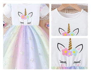 Close-up of girls' rainbow mesh skirt featuring silver unicorn gold stamping details