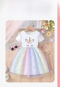 Detail of girls unicorn rainbow dress with white cotton bodice and layered mesh skirt