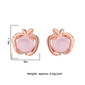 Detail view of apple-shaped pink quartz stud earrings in rose gold with dimensions