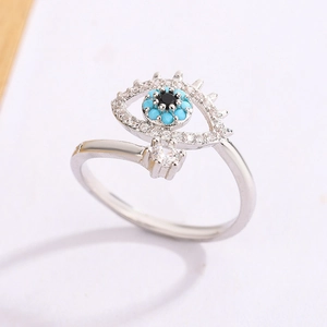 Adjustable evil eye ring with blue zircon inlay and sparkling crystal drop pendant