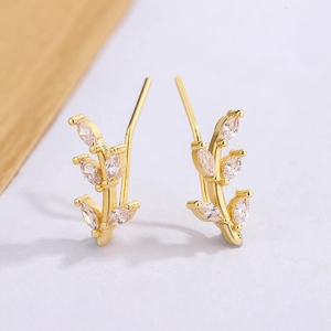 Boucles d'oreilles feuilles dorées avec zircons blancs brillants taille marquise
