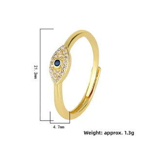 Detailed view of evil eye adjustable ring with blue stone and white crystals