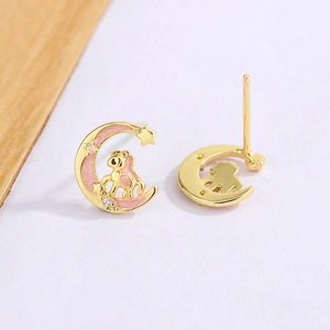 Luxuriöse Mond Einhorn Ohrstecker in Gold mit rosa Emaille und funkelnden Kristallen