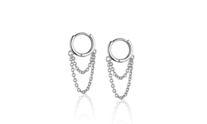 Macro shot of silver chain drop earrings with dual chains and sleek polished finish