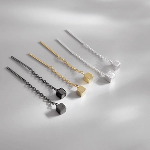 Minimalist geometric cube threader earrings in black, gold, and silver matte finishes