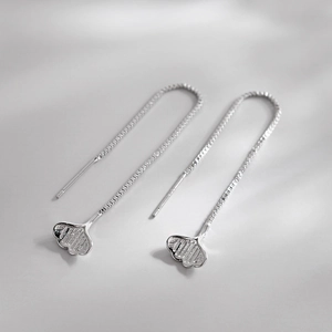Silver ginkgo leaf threader earrings with delicate long tassels and polished finish