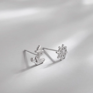 Asymmetric S925 sterling silver anchor and helm stud earrings with elegant light shadow