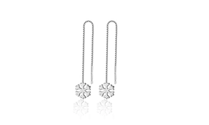 Detailed macro view of S925 sterling silver snowflake threader earring with hallmark