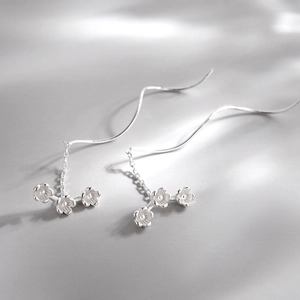 Elegant S925 sterling silver tassel earrings with three minimalist floral petal drops