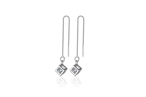 Macro shot of S925 hallmark on minimalist silver cube tassel earrings with zircon stones
