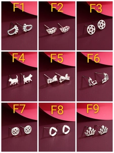 Macro view of S925 sterling silver stud earrings in nine diverse geometric shapes