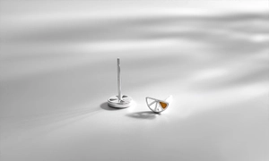 Detailed view of handmade S925 silver lemon stud earrings with vibrant orange enamel finish