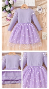 Close-up of girls purple long sleeve dress featuring butterfly print tulle and ribbed knit fabric