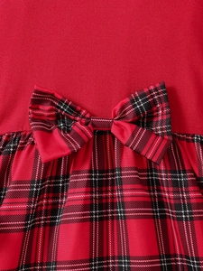 Girl's red Christmas dress with plaid long sleeves and a large bow tie party gown