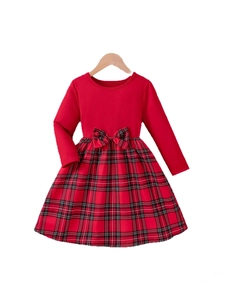 Girls long sleeve Christmas dress with red bodice, plaid skirt and bow accent