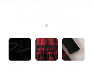 Detail of red and black plaid fabric and black ribbed knit sleeve cuff stitching