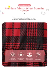 Detail of soft red and black plaid cotton fabric featuring breathable and skin-friendly texture