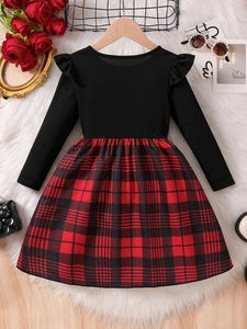 Girls long sleeve festive dress with black knit top and red plaid skirt overlay