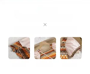 Detailed view of bohemian girls dress fabric with ethnic knit patterns and puff sleeves