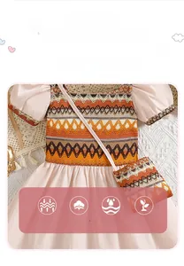 Detail of girls pink bohemian dress featuring colorful crochet patterns and cotton fabric