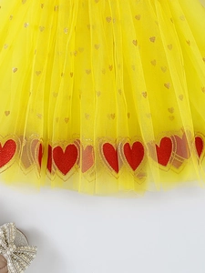 Yellow layered tutu skirt for girls featuring red glitter hearts and sequin details