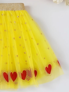 Girls yellow tiered tutu skirt with gold elastic waistband and red sequin heart patch
