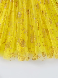 Girls bright yellow tiered tulle skirt with gold floral print and pleated princess layers