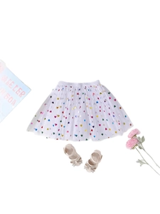 White tulle skirt for girls featuring colorful heart sequins and sparkly bow shoes