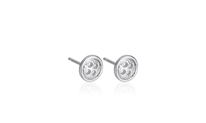 Detail of s925 silver stud earrings with a textured hammered finish and button design