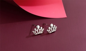 Detailed close-up of S925 sterling silver crown stud earrings with intricate beadwork