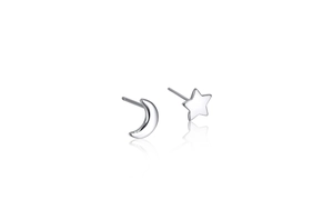 Macro detail of S925 sterling silver asymmetrical moon and star stud earrings