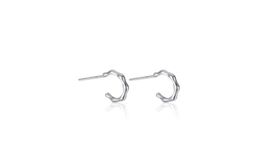 Close-up of S925 silver bamboo-shaped hoop earrings with a polished metallic finish