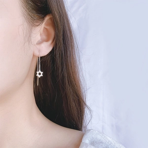 Élégantes boucles d'oreilles traversantes en argent S925 avec étoiles à six branches