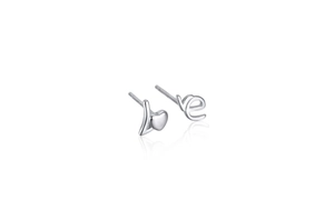 Macro shot of S925 sterling silver asymmetrical Love earrings with heart detail