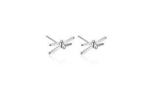 Macro shot of S925 sterling silver knot stud earrings with polished thorny wire texture