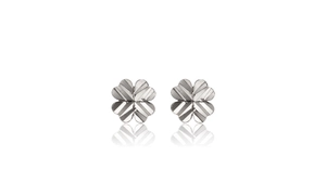 Detail showing S925 sterling silver clover earrings with a radiant textured metallic finish