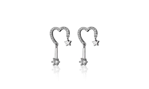 Detail of silver heart earrings with hollow star charms and round crystal drops