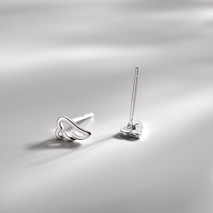 Polished S925 sterling silver angel wing stud earrings with elegant long shadows