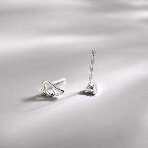 Polished S925 sterling silver angel wing stud earrings with elegant hollow design