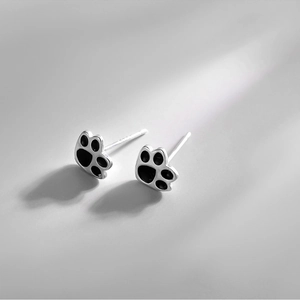 Minimalist cat paw stud earrings with black enamel finish in polished S925 sterling silver