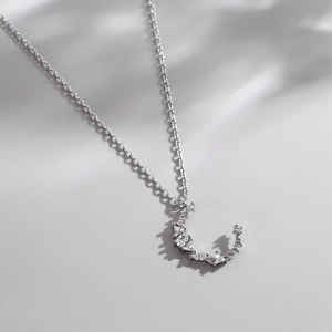Minimalist 925 sterling silver crescent moon pendant necklace with sparkling zircons