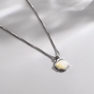 Elegant shell pendant necklace featuring natural mother of pearl on a silver box chain