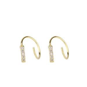 Macro view of gold-plated hoop earrings with five clear round zircon stones