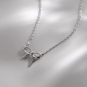 Classic S925 sterling silver bow pendant necklace with polished finish for women
