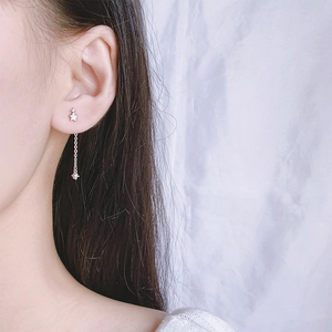 Minimalist silver star drop earrings with long thin chain and sparkling zircon stone