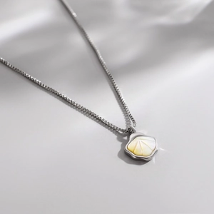 Minimalist shell necklace with iridescent white mother-of-pearl pendant and box chain
