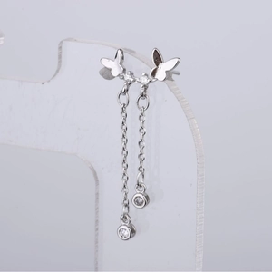 Silver butterfly drop earrings with long metal tassels and sparkling round crystals