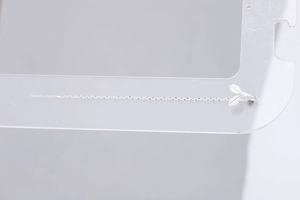 Detailed view of S925 sterling silver leaf tassel earring on transparent acrylic stand