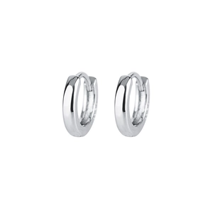 Minimalist silver huggie hoop earrings with a polished finish and secure spring clasp