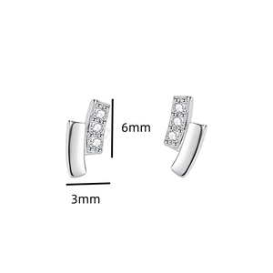 Detail view of silver geometric stud earrings with zirconia and dimensions 6mm by 3mm